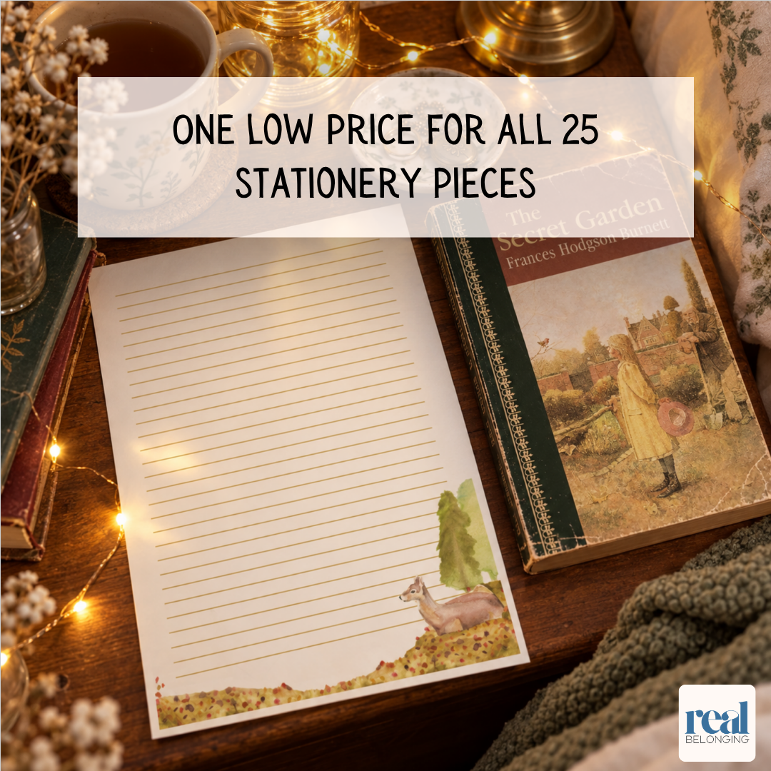Lined watercolor letter paper beside a vintage novel with fairy lights and a cup of tea