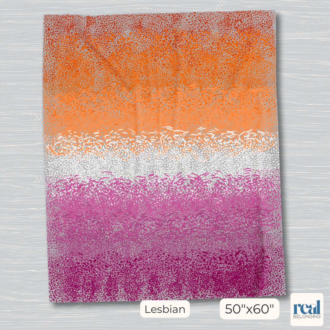 50"x60" gray blanket with lesbian pride flag printed in hand-drawn spots indicating motion and stillness across the canvas. 7 colors from dark blood orange up top, orange, light orange, white, pink, dusty rose pink, and dark pink at the bottom.
